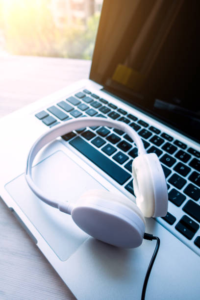 istock Headphones with laptop 813155552