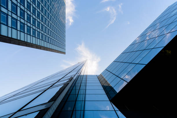 istock Skyscrapers and glass buildings with blue sky. 813171808