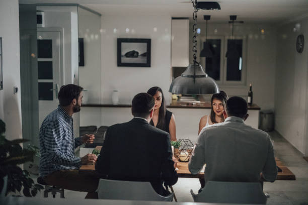 istock Group of friends eating at the dining table 813186800