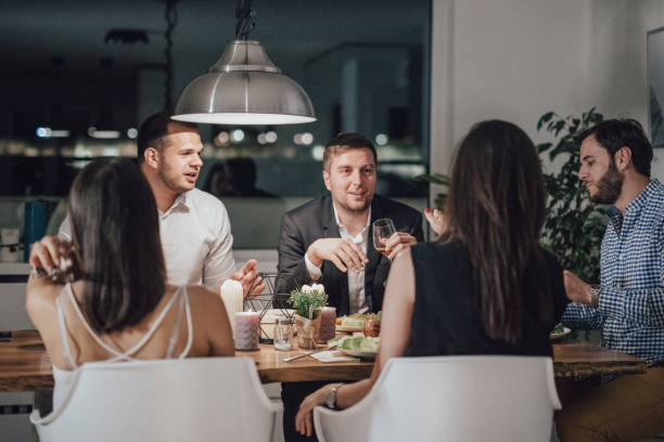 istock Happy friends at the dinner party. 813191786