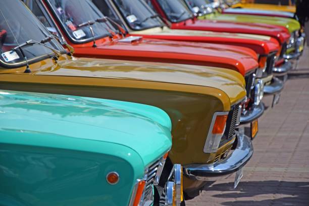 Classic Polski Fiat 125p cars on the parking Warsaw, Poland - May 31, 2015: Classic Polski Fiat 125p cars on the parking during the meeting of Polski Fiat 125p friends. This vehicle was the most popular car in Poland in 70s and 80s. little fiat car stock pictures, royalty-free photos & images