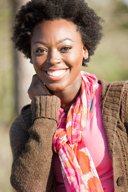 istock One African descent woman outdoors in park. 813199162
