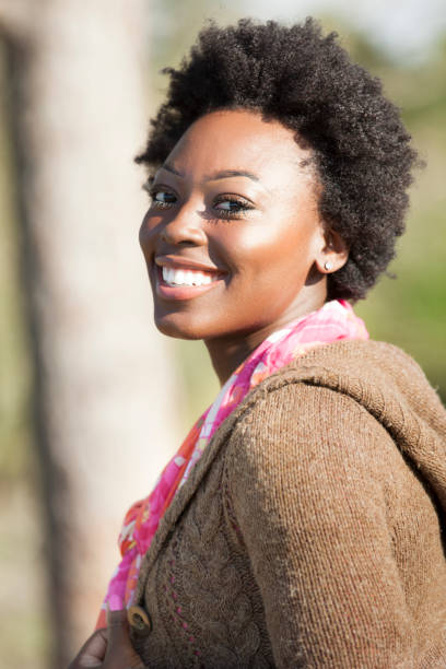 istock One African descent woman outdoors in park. 813199226