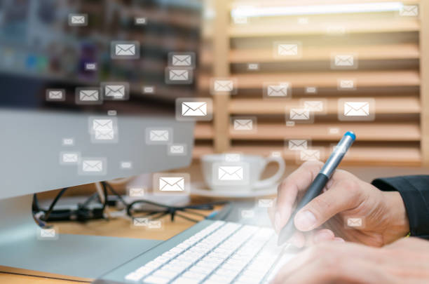 istock Many e-mail on the hand writing over the computer keyboard blurred background, business technology concept 813207674