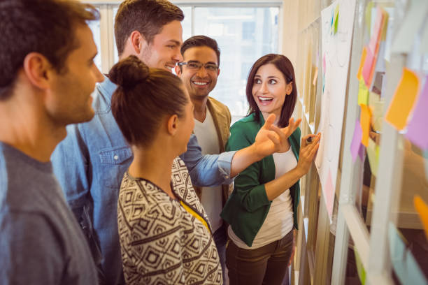 istock Happy business team in a meeting 813210644