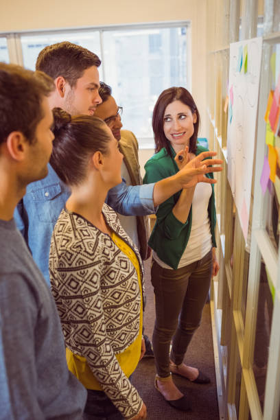 istock Happy business team in a meeting 813210738