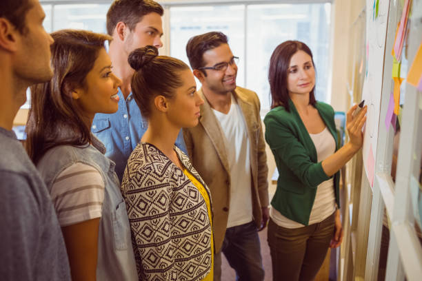 istock Happy business team in a meeting 813210848