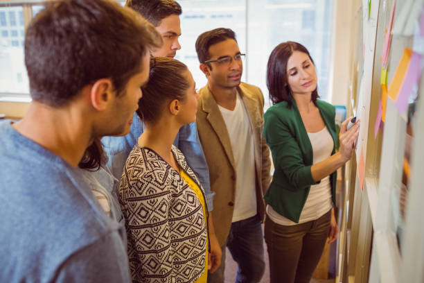 istock Happy business team in a meeting 813210996