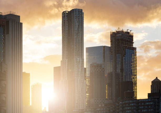 istock Sunset behind modern skyscrapers in New York City 813211112