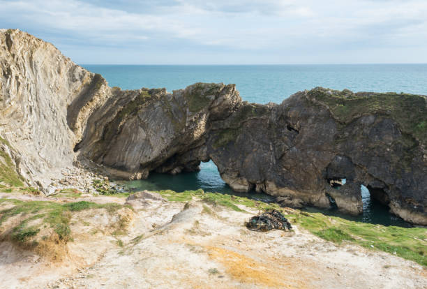istock Stair Hole in Lulworth Cove, England 813218004
