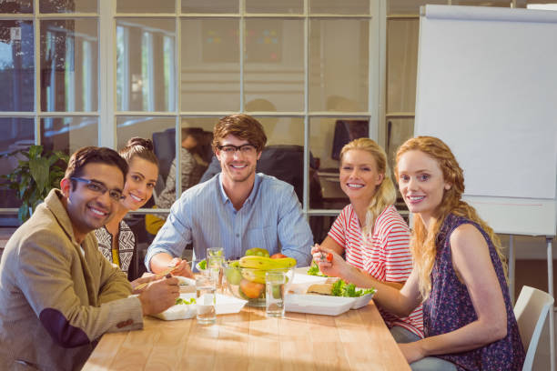 istock Business people having lunch 813225162