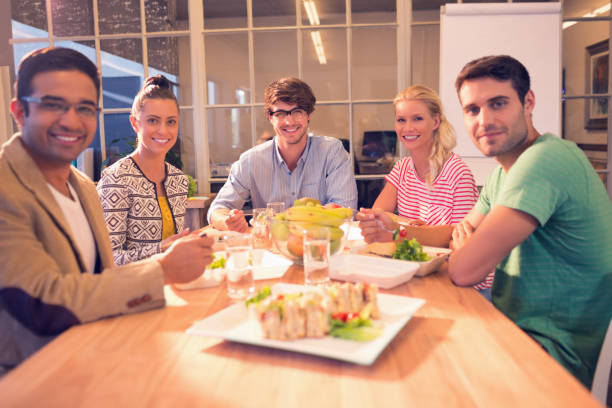 istock Business people having lunch 813225560