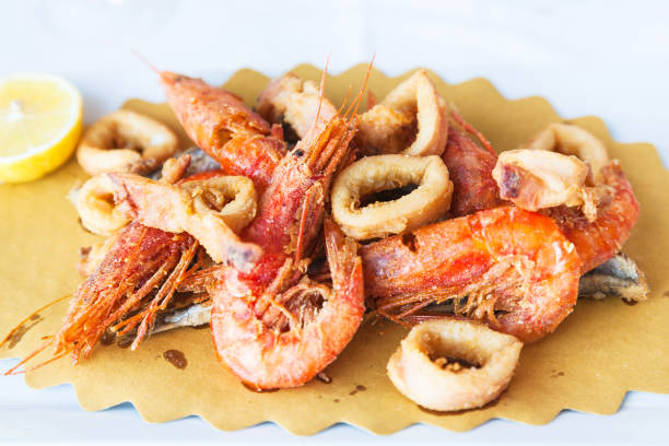 istock plate with fried seafood in sicilian restaurant 813225734