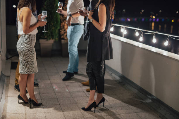 istock People drinking wine on the balcony 813232228