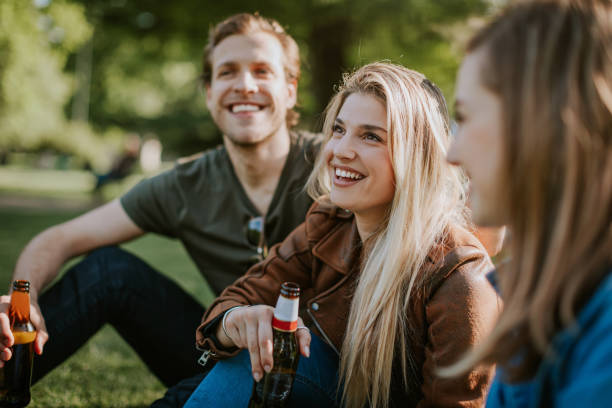 istock Friends enjoying outdoors with the beer 813247050