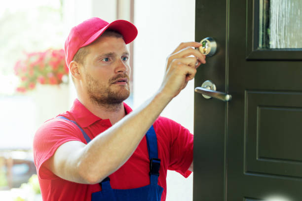 istock handyman fixing house door lock 813283762
