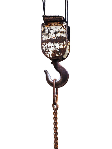 Ancient crane hook with suspended chain, isolate on white background