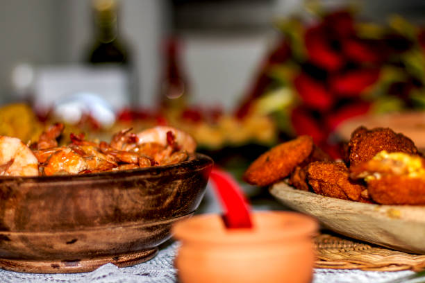 Fillet of chicken on a white plate placed on a table. Surface level shot with out of focus interior. 