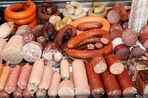 Variety of sausage products in a butcher´s shop