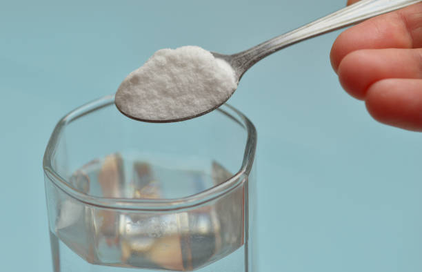 istock Sodium bicarbonate in a glass 813311604