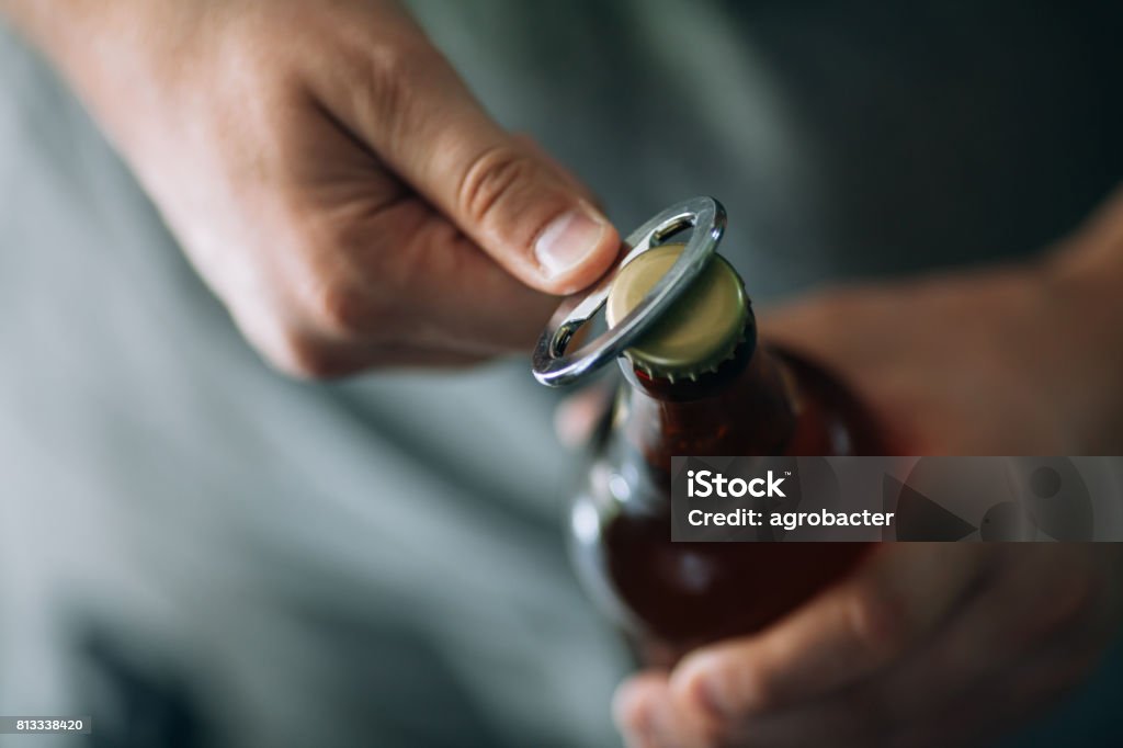 Opening a beer Beer - Alcohol Stock Photo