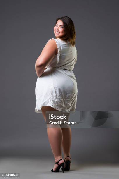 Happy Plus Size Fashion Model In Casual Clothes Fat Woman On Gray Background Overweight Female Body Stock Photo - Download Image Now