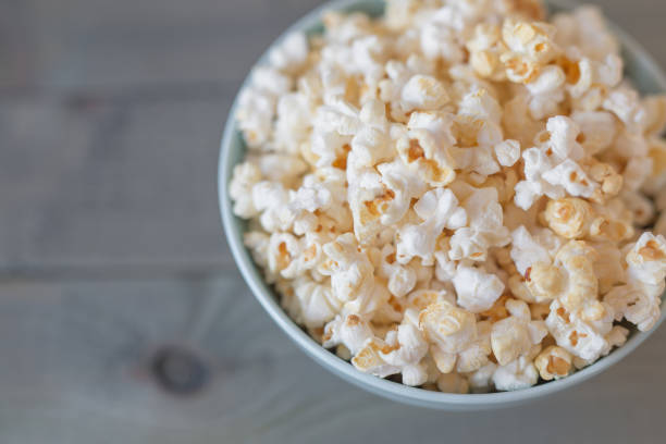 istock Popcorn in a pastel blue bowl 813350936