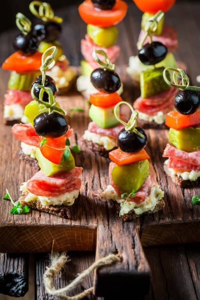 istock Closeup of various snacks with vegetables and herbs 813358232
