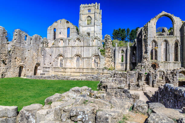 istock Fountains Abbey ruins, North Yorkshire, UK 813366382