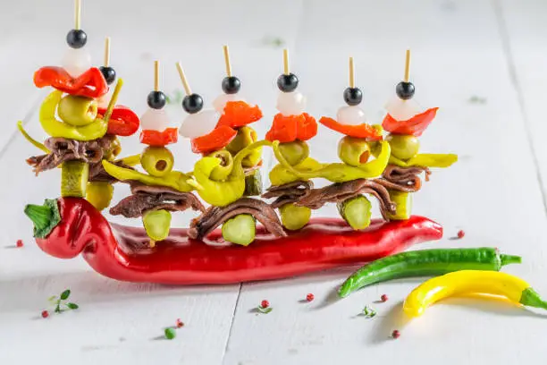 Banderillas with peppers, olives and anchovies for spanish corrida