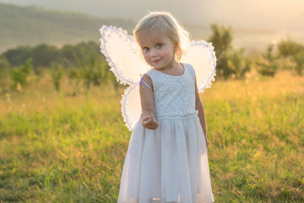 istock little girl outdoors summertime 813375732