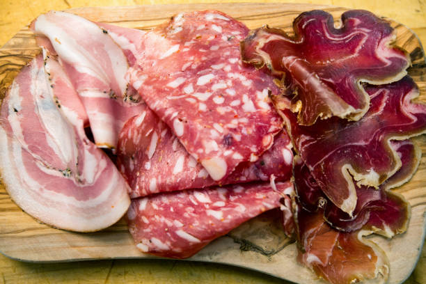 istock Small Charcuterie Plate with Ham, Salami and Prosciutto 813375942