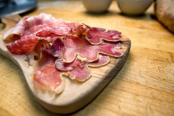 istock Small Charcuterie Plate with Ham, Salami and Prosciutto 813380722