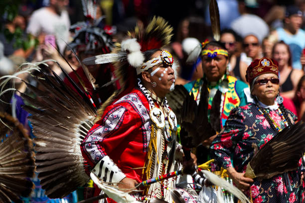 Kahnawake, Quebec, Canada - July 9, 2017 : Pow Wow  in Kahnawake Reserve for their 27th Annual Echoes Of A Proud Nation Pow Wow. Adult man dancer.