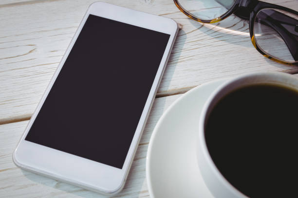 istock Overhead shot of smartphone 813385568