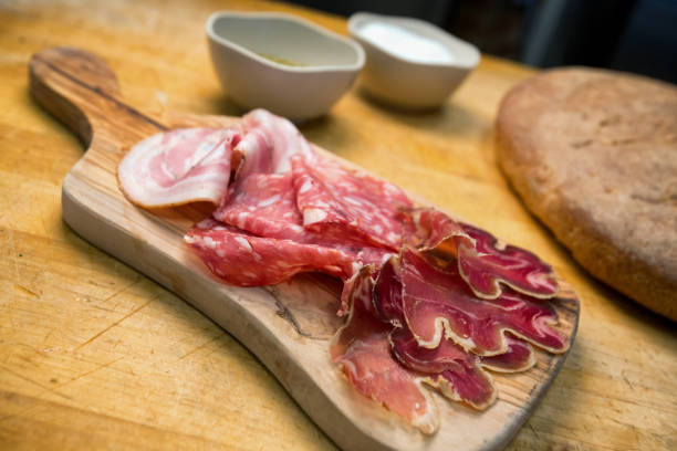 istock Small Charcuterie Plate with Ham, Salami and Prosciutto 813388274