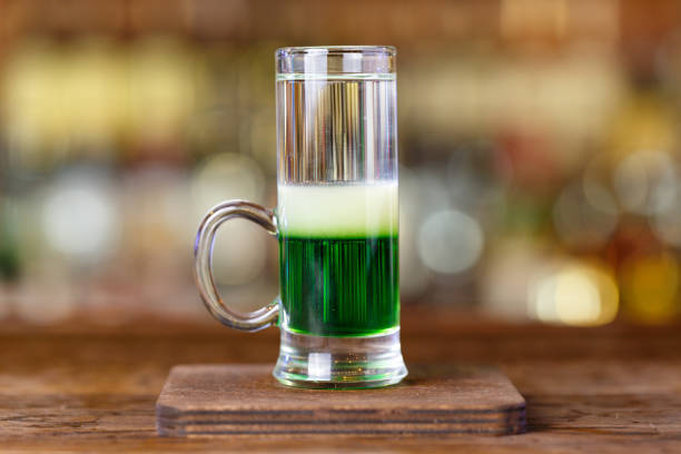 istock Cocktail shot green mexican 813395410