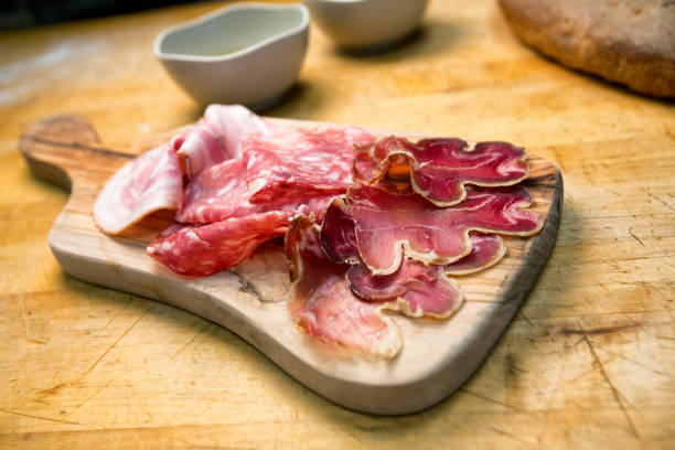 istock Small Charcuterie Plate with Ham, Salami and Prosciutto 813413904