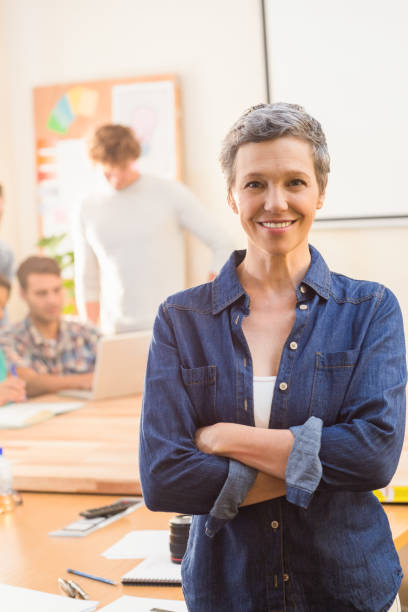 istock Creative businesswoman smiling at the camera 813416602