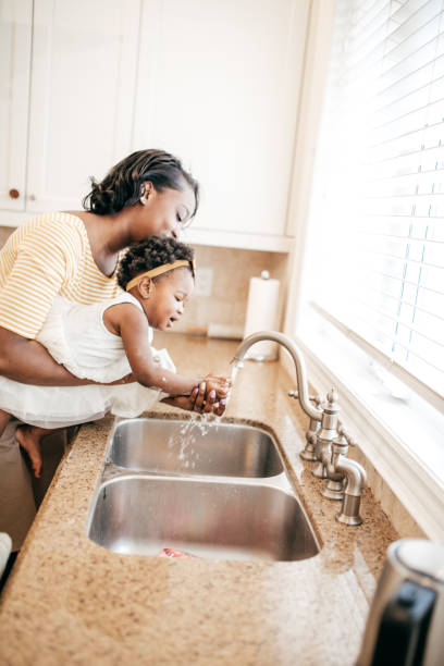 istock Mom and toddler baking together 813452094
