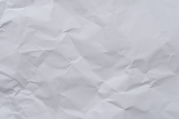istock White crumpled paper background and texture 813452398