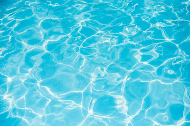 istock Blue and bright ripple water and surface in swimming pool 813452448