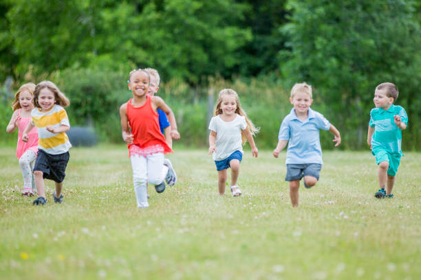 istock Preschool Children Having Fun Outside 813455446