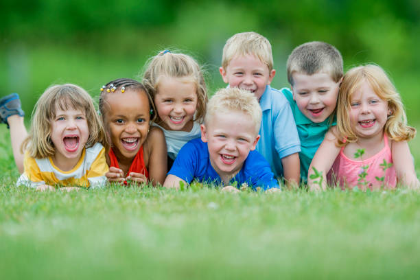 istock Preschool Children Having Fun in Large Group 813455448
