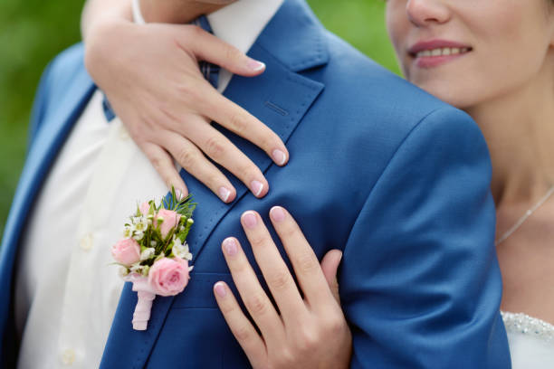 istock Wedding couple on the nature is hugging each other 813459466