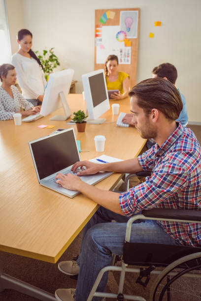 istock Creative casual businessman in wheelchair 813461504