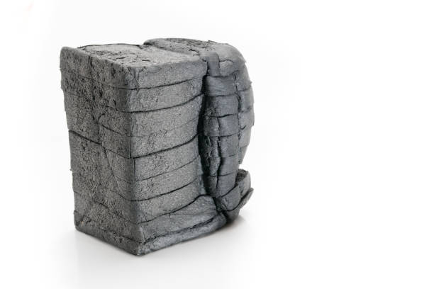 istock loaf slide of charcoal bread black bread isolated on white 813464220