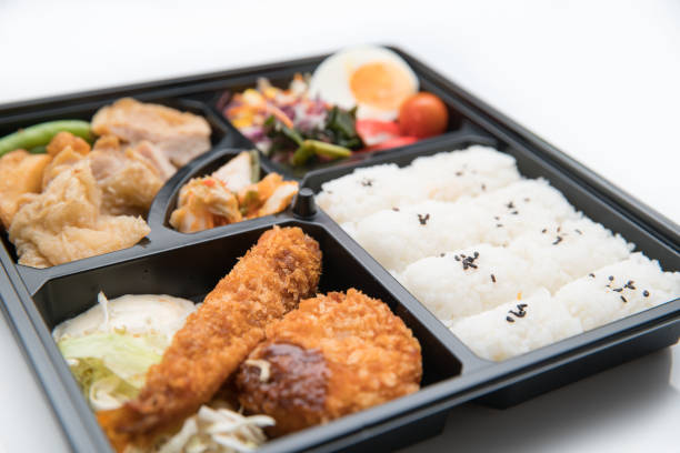 istock japanese cuisine. lunch box set on the background 813464232