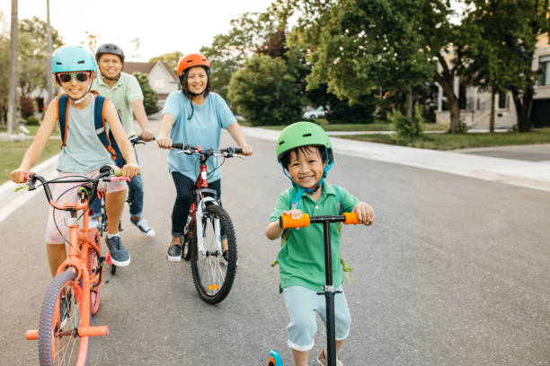 istock Happy family riding bikes 813469092
