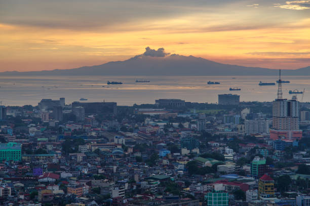 istock sunset in metro manila , philippines 813481230